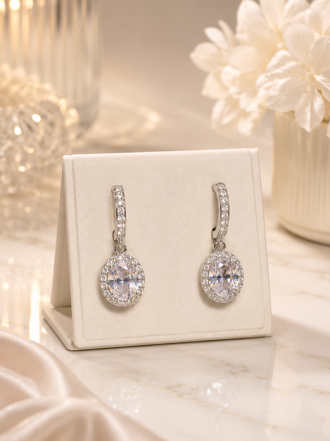 Silver earrings with clear gemstones