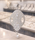 Women silver diamond sari brooch